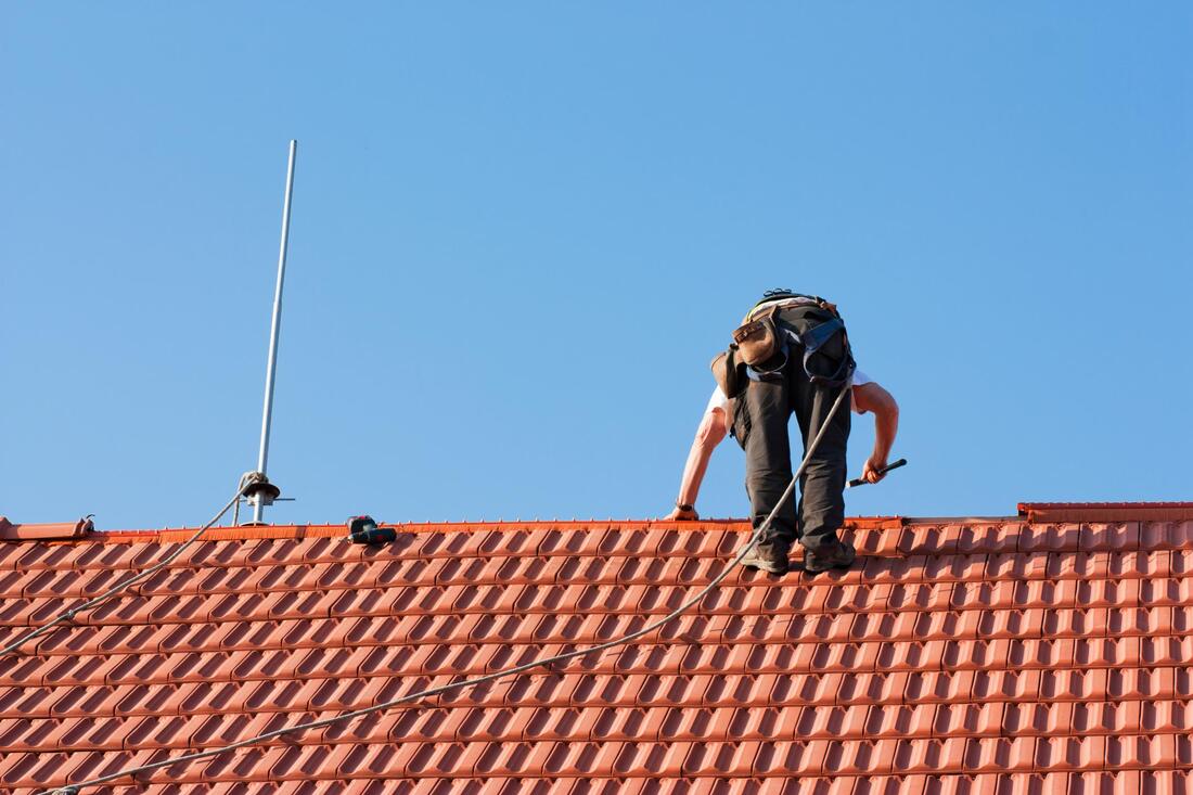 worker in the roof